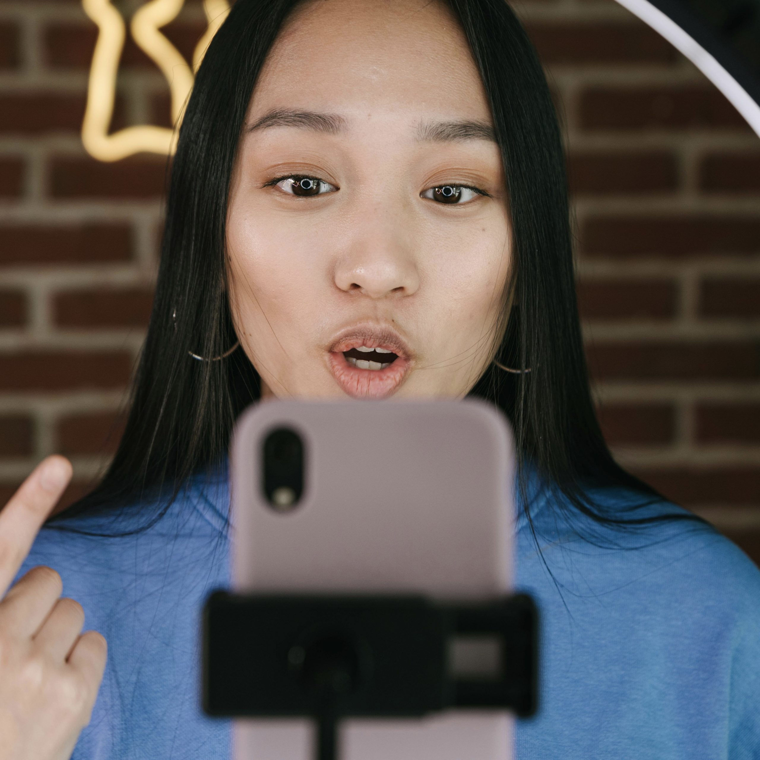 content creator filming a UGC video